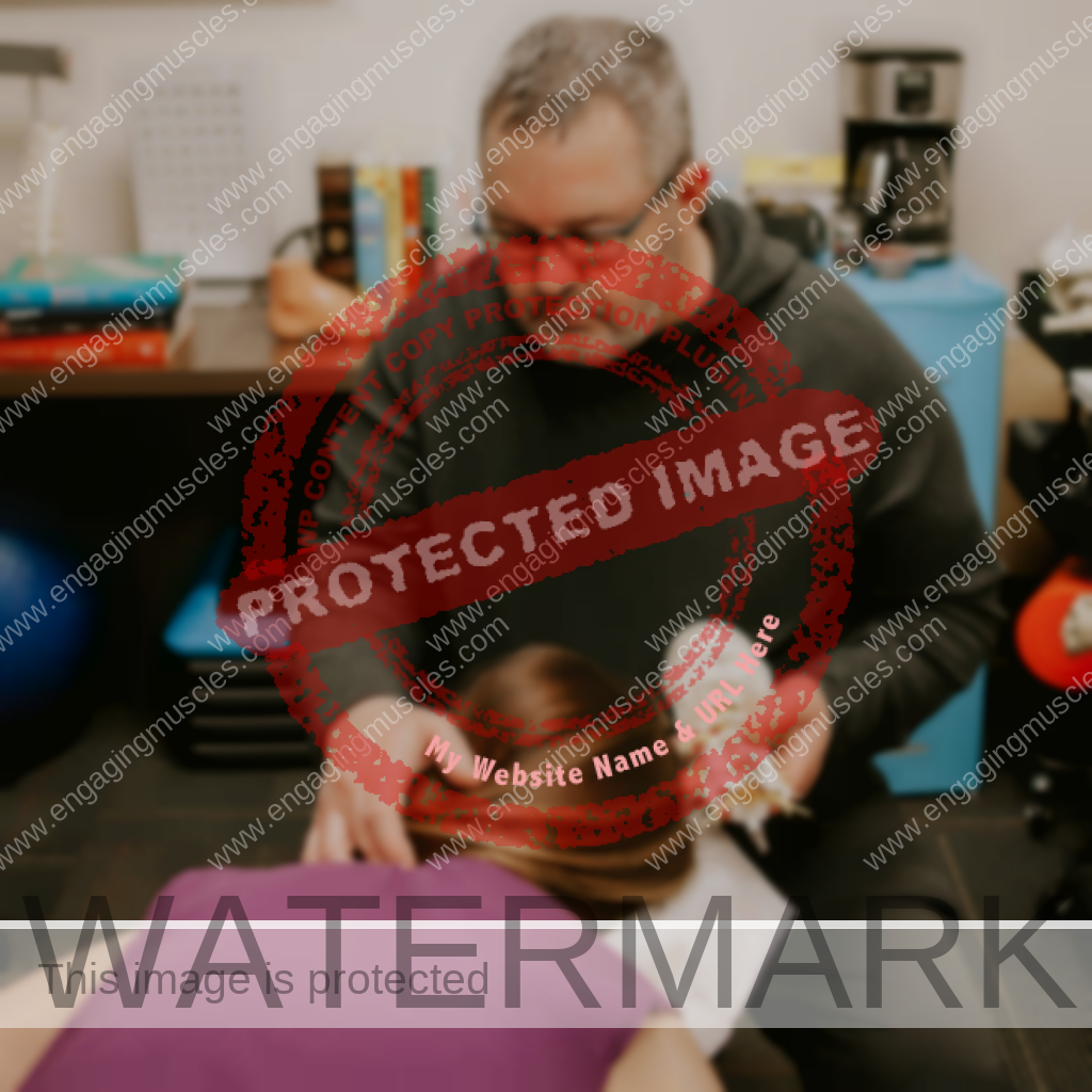 <img src="https://engagingmuscles.com/wp-content/uploads/2023/08/rick-merriam-holds-cervical-spine-while-massaging-neck.png" alt="Rick Merriam holds cervical spine model in left hand while applying massage technique to client's neck with his opposite hand." width='1024" length="1024" />